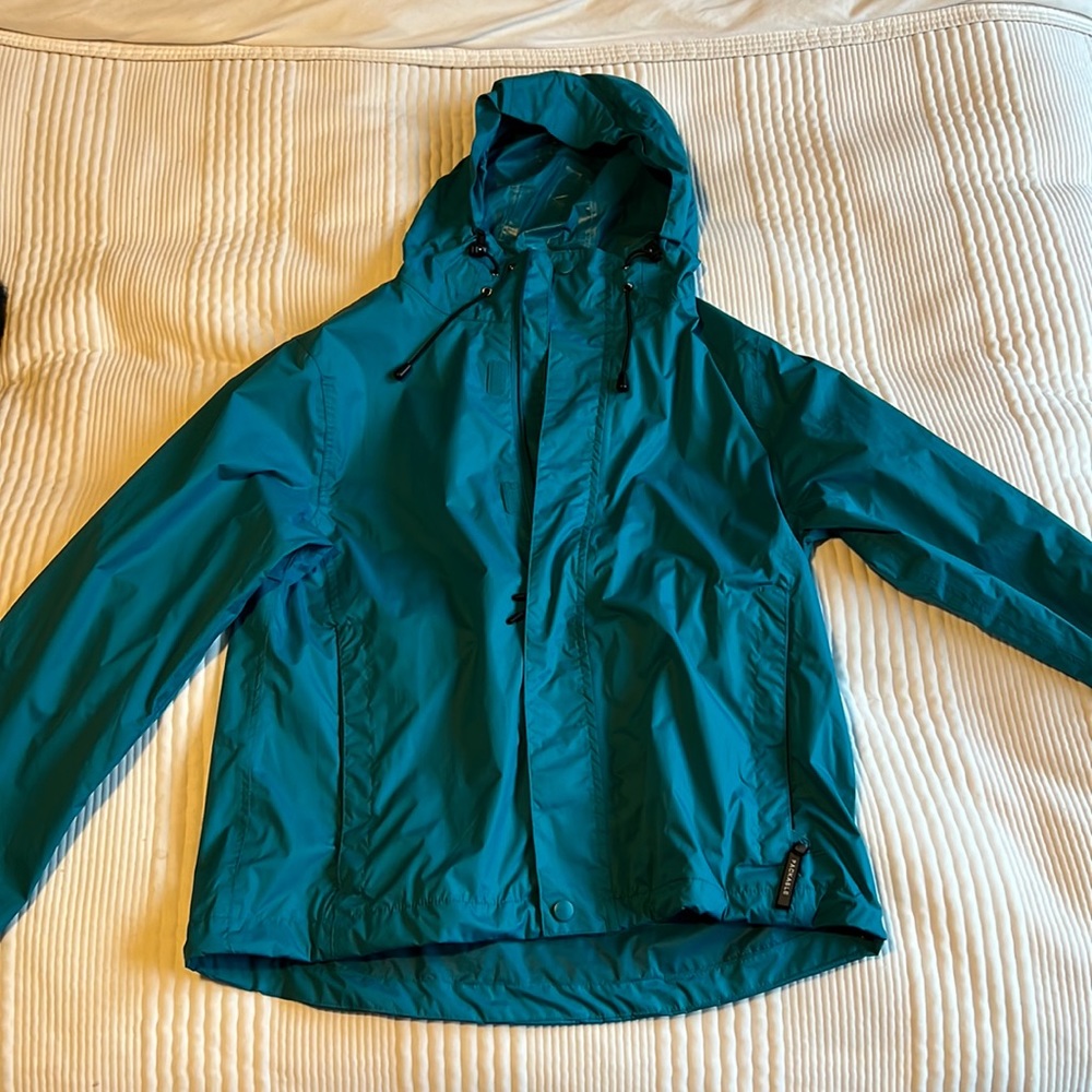 Bright teal rain coat